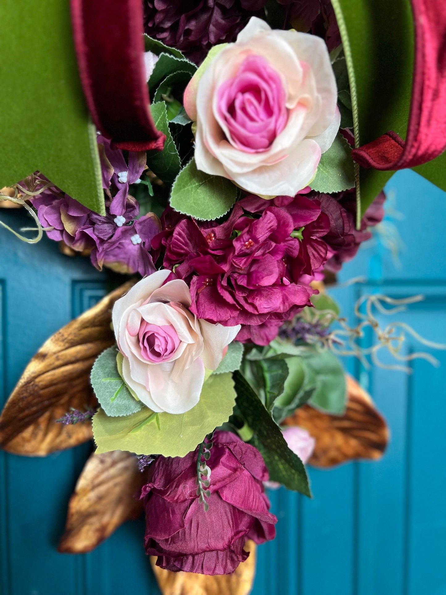 Swag for home decor. Burgundy, plum, moss, gold magnolia leaves and medium size