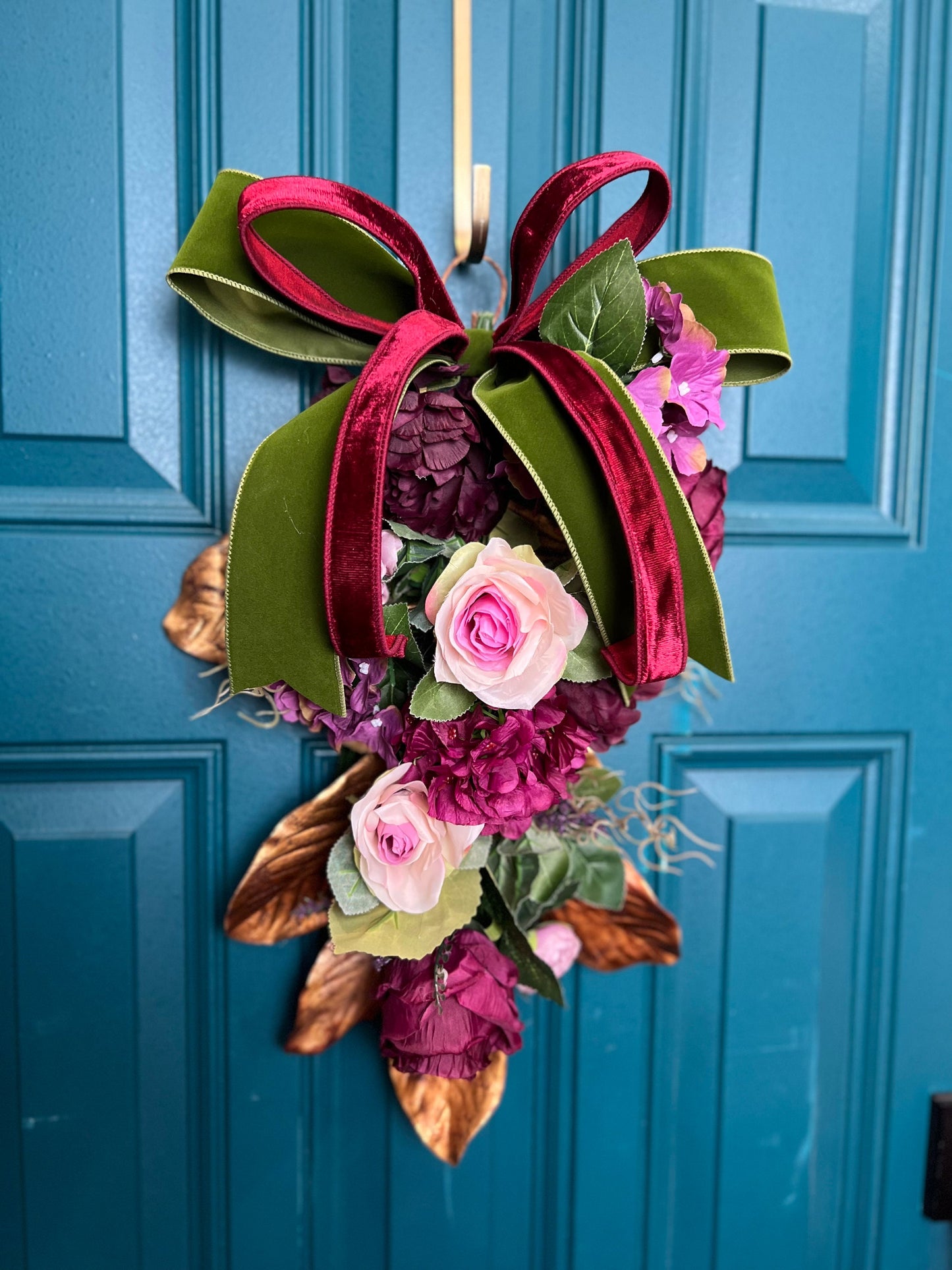 Swag for home decor. Burgundy, plum, moss, gold magnolia leaves and medium size